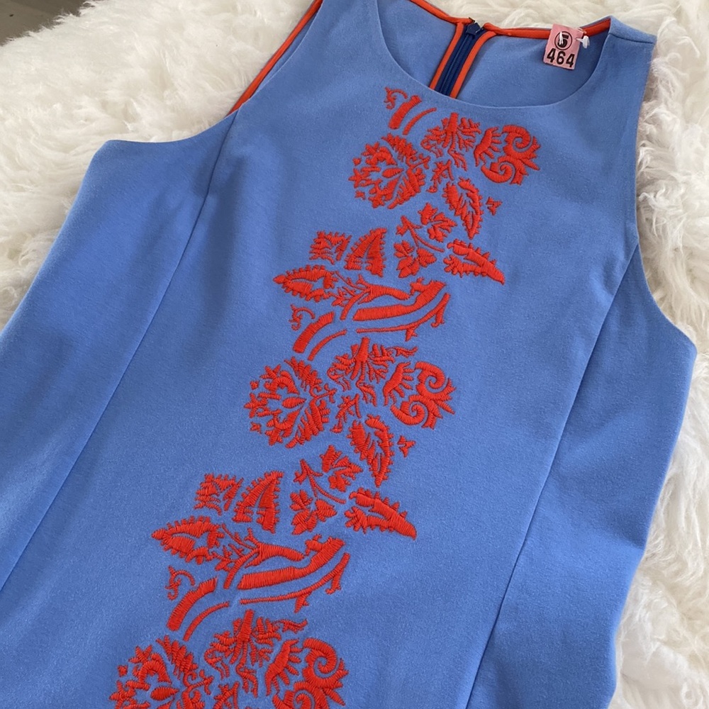Stunning dress in light blue with coral embroidery. Stretchy cotton.